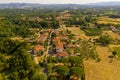 Drone photography of small rural town surrounded by agricultural fields, vineyards and olive trees Royalty Free Stock Photo