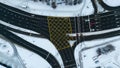 Drone photography of top down view multiple lane roads interchanging during winter day Royalty Free Stock Photo