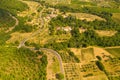 Drone photography of tuscan rural landscape of small olive tree farms and vineyards Royalty Free Stock Photo