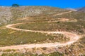 Drone photography from the winding country road to the top of Attavyros Mountain. Rhodes Island, Greece. Royalty Free Stock Photo