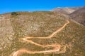 Drone photography from the winding country road to the top of Attavyros Mountain. Rhodes Island, Greece. Royalty Free Stock Photo