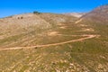 Drone photography from the winding country road to the top of Attavyros Mountain. Rhodes Island, Greece. Royalty Free Stock Photo