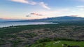 Drone photos over the Kohanaiki Private Club Community on the Big Island, Hawaii. With lush green landscape and luxury housing