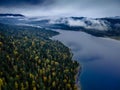 The drone picture of cloudy and foggy Lake Teletskoye in Altai mountains forests in Russia Royalty Free Stock Photo