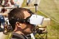 Drone pilot wearing first-person view headset