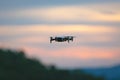 Drone pilotage on the sky at sunset Royalty Free Stock Photo