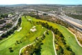 Drone point of view golf course during sunny summer day Royalty Free Stock Photo