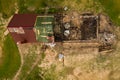 Drone point of view of half burned down house