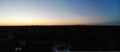 Drone PoV: Chicago skyline silhouette backlit jusst before sunrise Royalty Free Stock Photo