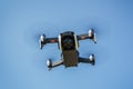 Drone with propellers flies in sky and photographs Royalty Free Stock Photo
