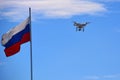 Drone quadcopter with digital camera in flight. Drone with digital camera flying over a Russia flag Royalty Free Stock Photo