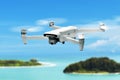 Drone quadcopter with digital camera flying Royalty Free Stock Photo