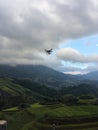 Drone quadcopter digital camera while flying over the longji terrace Royalty Free Stock Photo