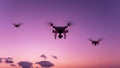 Drone quadcopter with digital camera flying in sunset evening time Beautiful light of nature background Royalty Free Stock Photo