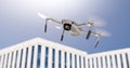 Drone quadcopter flies over office buildings