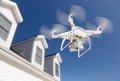Drone Quadcopter Flying, Inspecting and Photographing House Royalty Free Stock Photo