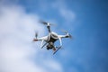 Drone quadrocopter with high resolution digital camera on the sky background. Royalty Free Stock Photo