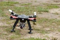 A drone is ready to fly and hovered above the ground before the race Royalty Free Stock Photo