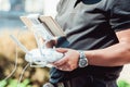 Drone remote control in hand of a man. Man operating of flying drone Royalty Free Stock Photo