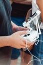 Drone remote control in hand of a man. Man operating of flying drone Royalty Free Stock Photo