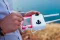 Drone remote control. Man holding copter controller with smartphone. Aerial video shooting Royalty Free Stock Photo