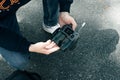 Drone remote control. Remote control in hand man. Man holds remote controller with his hands and controls the drone Royalty Free Stock Photo