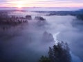 Drone\'s Eye View: Serene Sunrise Over Misty River and Woodland Landscape