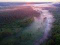 Drone\'s Eye View: Serene Sunrise Over Misty River and Woodland Landscape