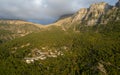 Drone scenery mikro Papingo village , Zagorochoria area, Epirus, Ioannina Greece. Astraka tower rocky cliffs above the village at Royalty Free Stock Photo