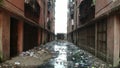 Drone Shoot of Dirty Garbage underline in ally of buildings in chawl system buildings, mumbai city, India.