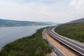 Drone shot aerial view landscape of under construction motorway tolls near big natural river Royalty Free Stock Photo