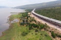 Drone shot aerial view landscape of under construction motorway tolls near big natural river Royalty Free Stock Photo