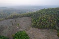 Drone shot aerial view scenic landscape of agriculture farm against mountain and nature forest