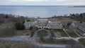 Drone shot of the Aldrich Mansion on the coast of a sea in Warwick, Rhode island, USA Royalty Free Stock Photo