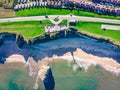 Drone shot of a beautiful shore with a green lawn in South Shields, UK