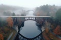 drone shot of a bridge over a foggy river