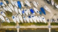 Winter harbour with plenty sailing boats shot from above