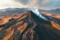 Drone shot of an erupting volcano with steaming lava on the hillside in Iceland landscape surrounded by other hills showing the Royalty Free Stock Photo