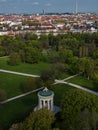 Drone shot from the famous Monopteros pavillon in Munich, English Garden Park in spring