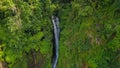 Drone shot Kapas Biru Waterfall is a hidden paradise in Lumajang, East Java with a height of about 90 meters, the water Royalty Free Stock Photo