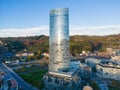 Drone shot over the Iberdrola Dorrea Skyscraper with cityscape in Bilbao, Spain with blue sky Royalty Free Stock Photo