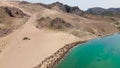 Drone shot of river Ili and herd of sheep