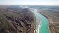 Drone shot of river Ili and spring steppe in Kazakhstan
