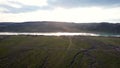 Drone shot of river Ili and spring steppe in Kazakhstan