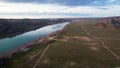 Drone shot of river Ili and spring steppe in Kazakhstan