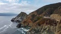 Drone shot of the rocks on Gray Whale Cove State Beach in California