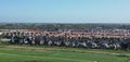 Drone shot of rural houses in scenic countryside, the Netherlands