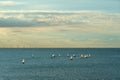 Drone shot of a sailing race off of the coast of Margate, Thanet, UK under sunset sky