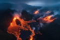 Drone shot of spectacular night landscape of some erupting volcano in Iceland with fiery lava flows illuminate the dark landscape Royalty Free Stock Photo