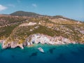 Drone shot of Zakynthos island with beautiful turquoise Ionian sea and limestone cliffs and cave near famous Navagio beach during Royalty Free Stock Photo